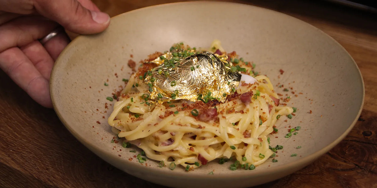 Pasta mit Gold verziert